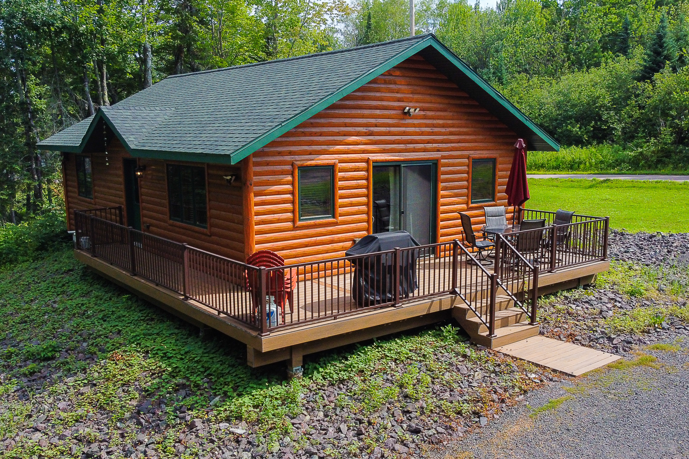 Cabin exterior and wrap-around deck