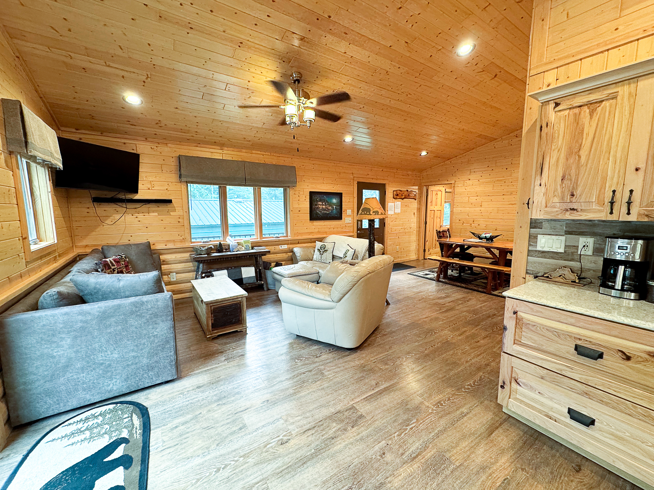 Open living dining and kitchen area inside Best Kept Secret
